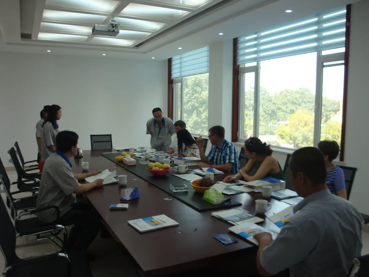 International customers and MERI team discussing mower configurations