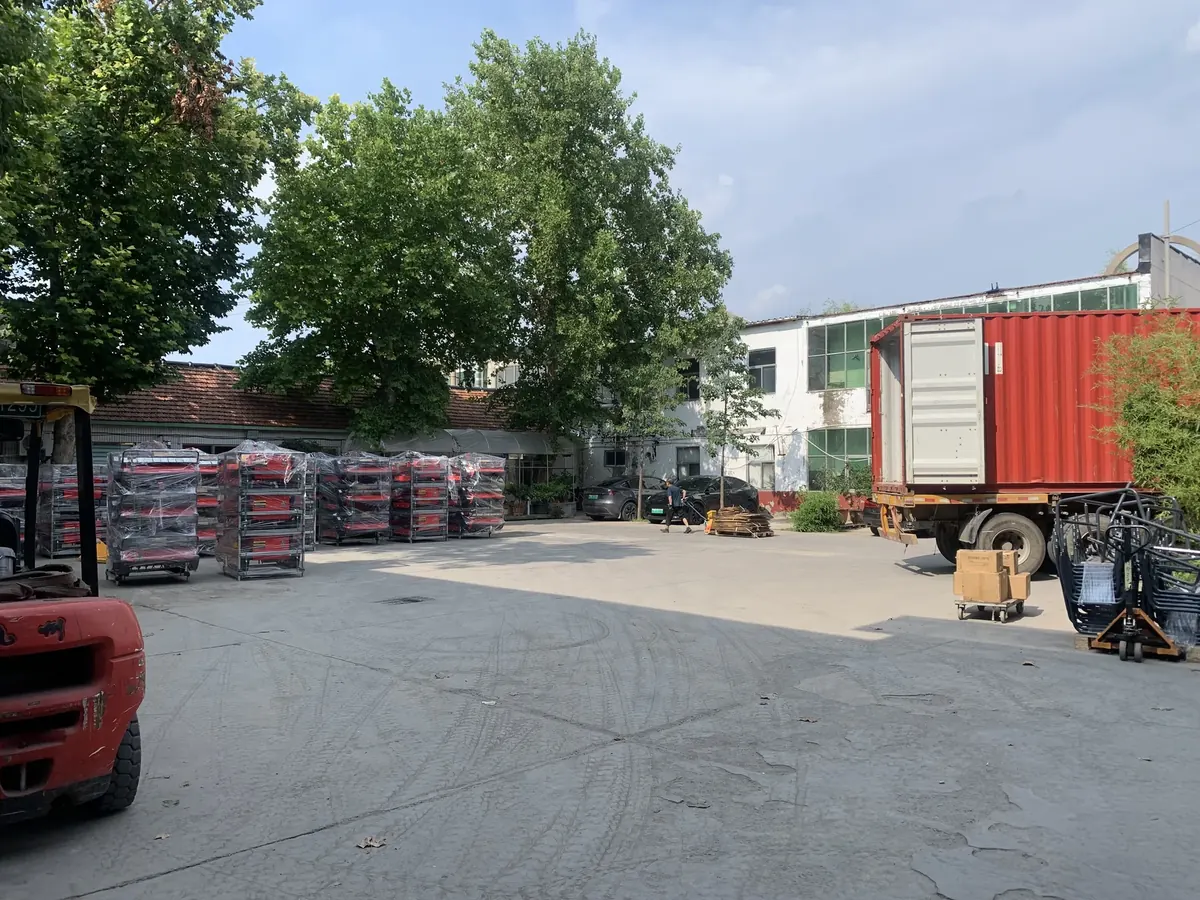 Multiple MERI remote control mowers prepared for container loading